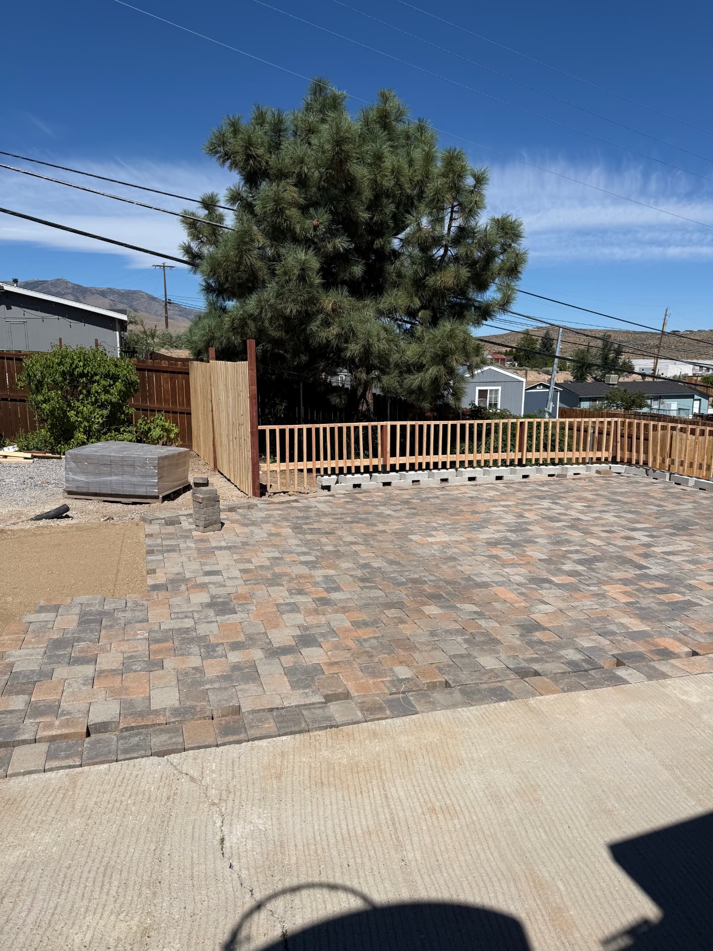 Paver patio laid and leveled before final compaction