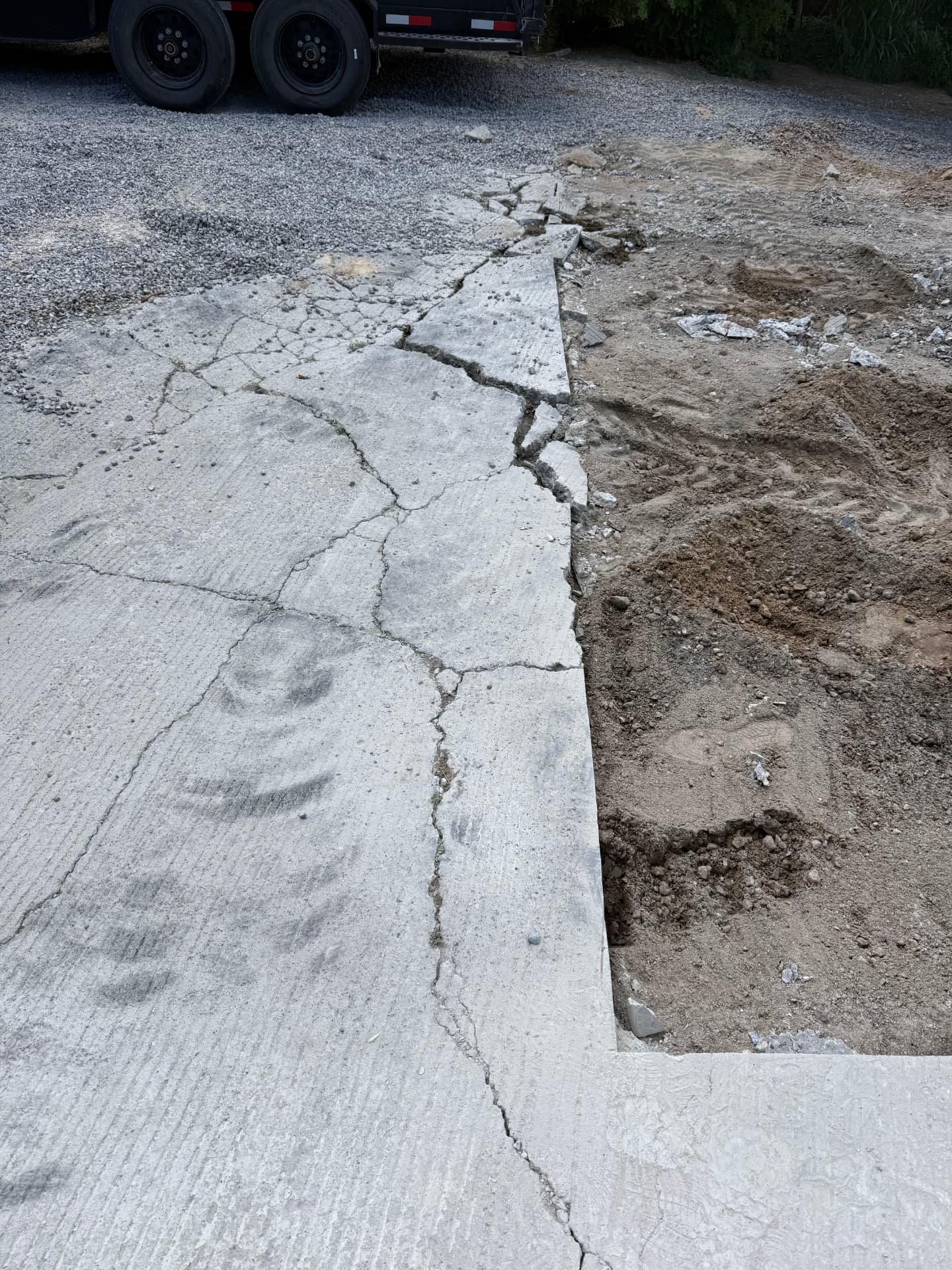Cracked concrete slab removed before the new pour