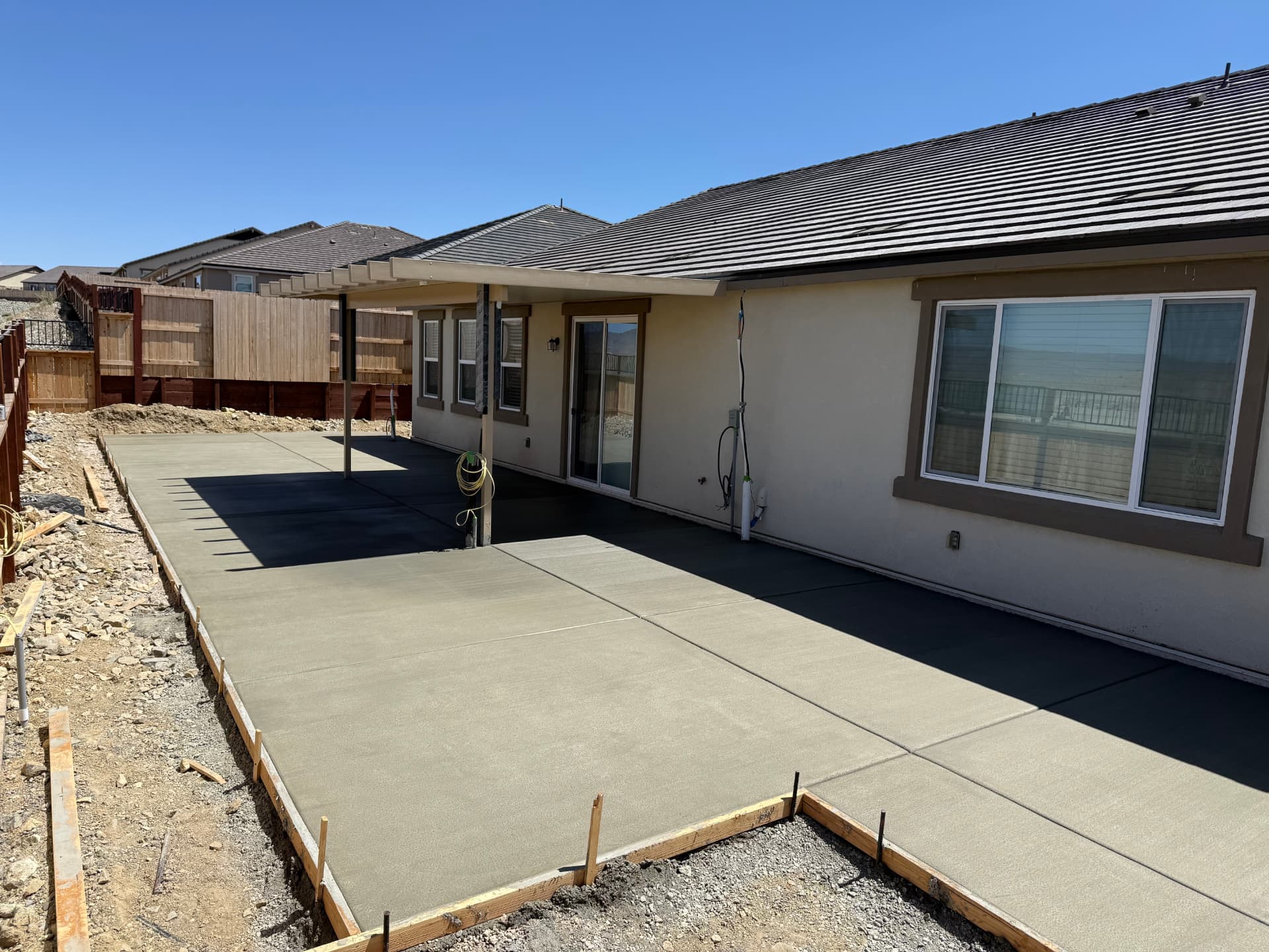 Completed concrete patio pour under the patio cover