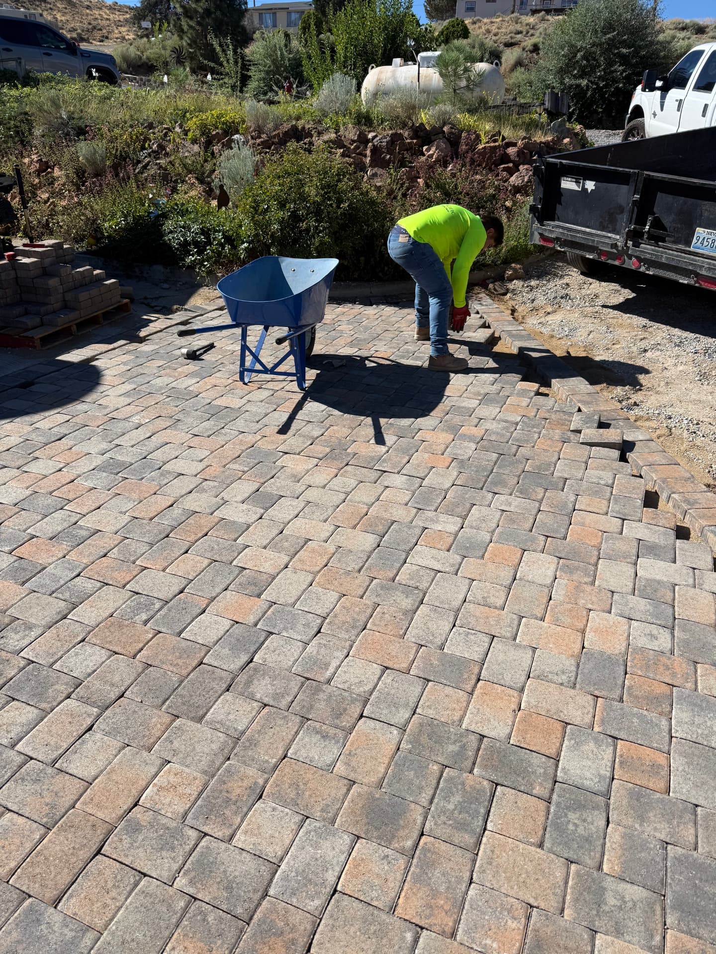 Paver driveway extension with soldier course edging mid-project