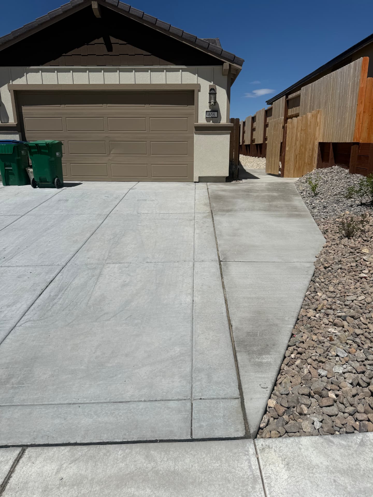 Completed driveway extension and walkway to the side gate