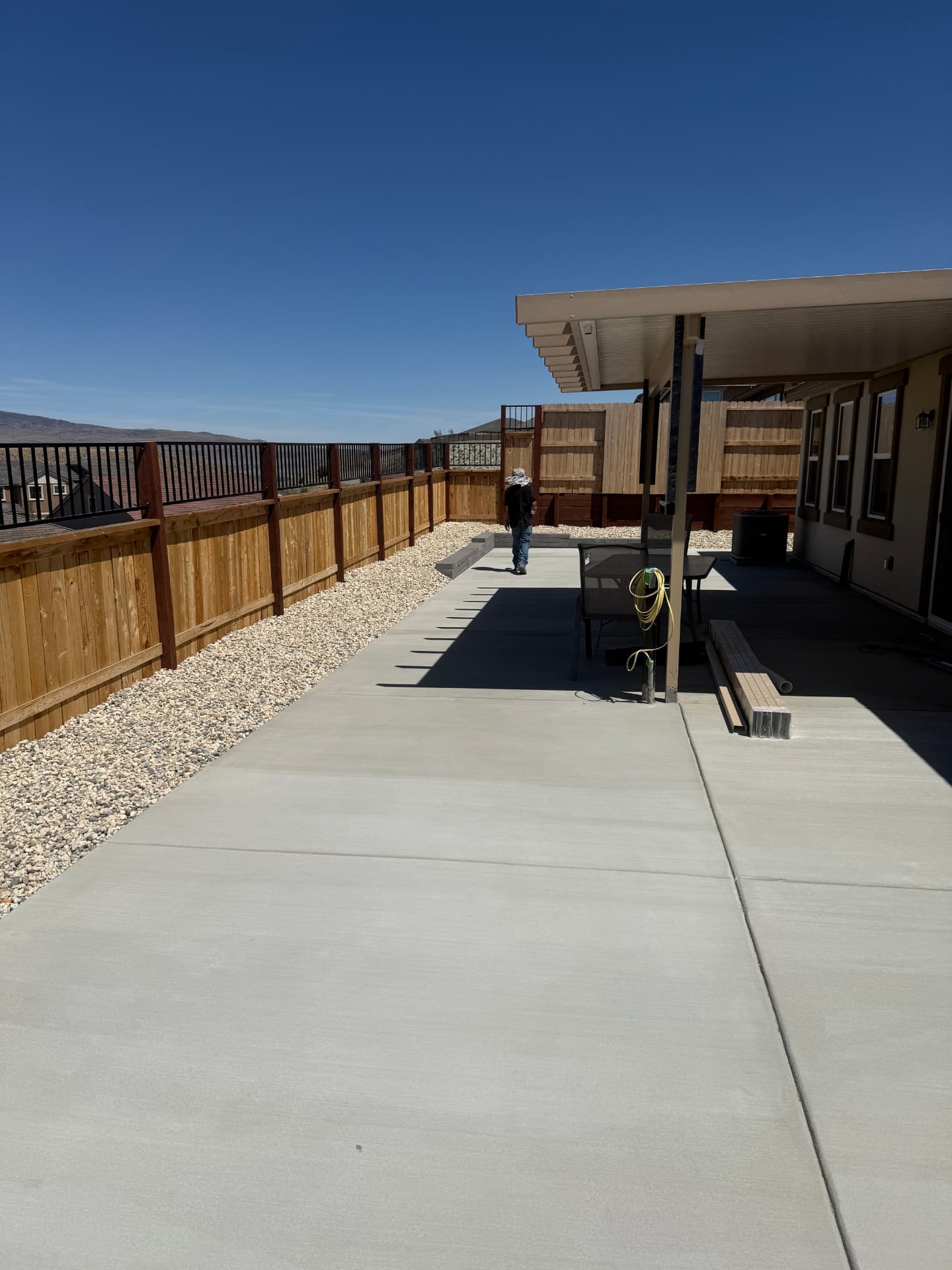 Large finished concrete patio under the cover with valley views